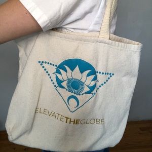 Elevate the globe tote bag